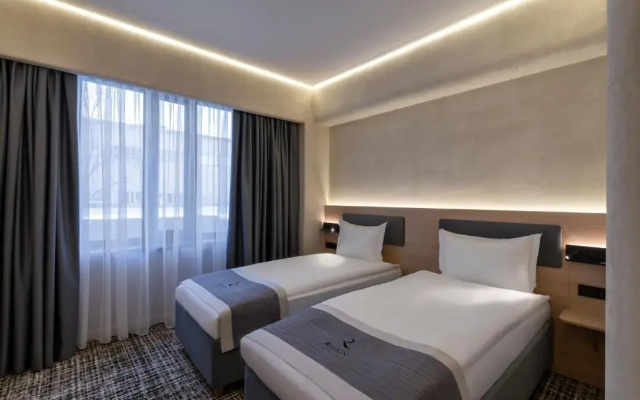 Отель Renion Almaty