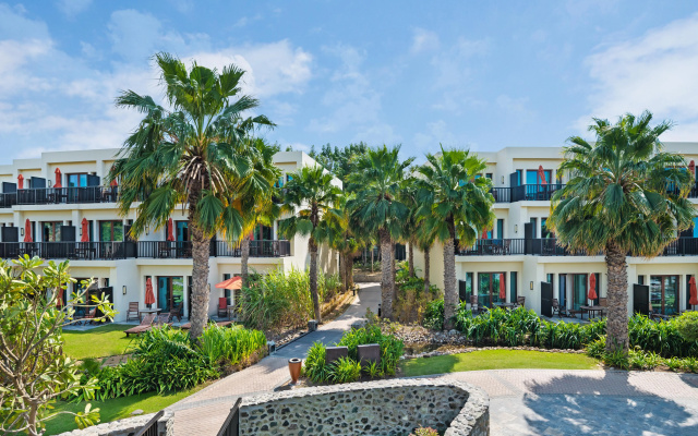 Отель JA The Resort - JA Palm Tree Court