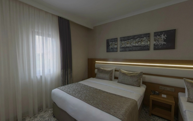 Отель Görükle Oruç & Spa