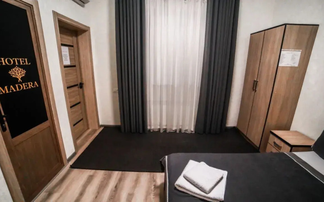 Отель Madera