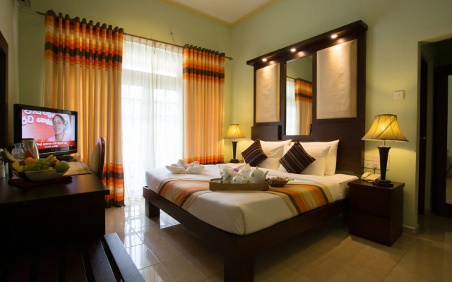 Отель Oak Ray Serene Garden Hotel