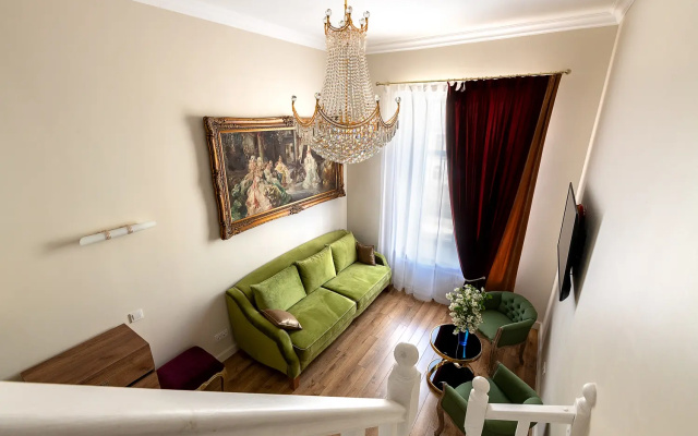 Апартаменты Легенды Невского Проспекта BookingSPB Музыкальная гостиная с видом на Дом Зингера