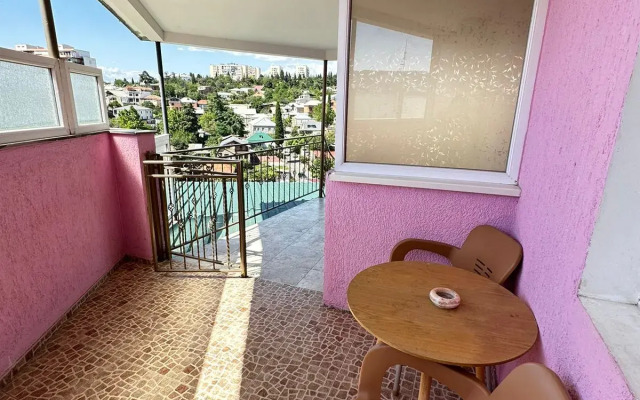 Deluxe Quadruple room with balcony and with city view · Hotel Piano — photo 2