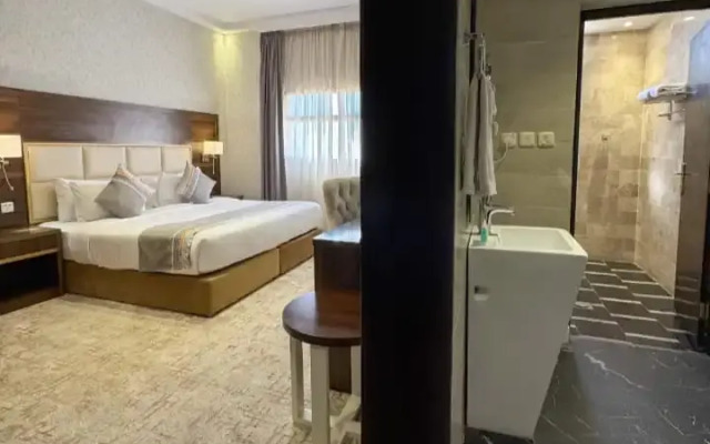 Отель Al-Ufq Suites
