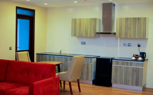 Отель King Jada Apartments & Hotel