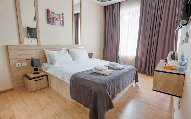 Superior room with city view · City Heart Hotel — photo 1