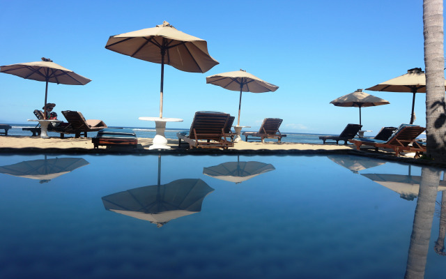 Отель La Taverna Suites