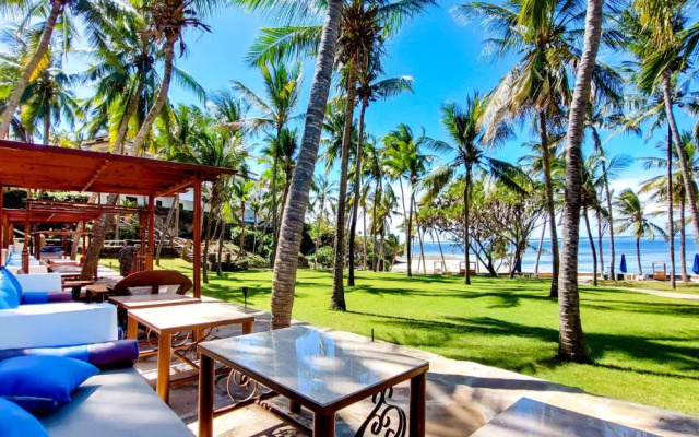 Отель PrideInn Flamingo Beach Resort & Spa