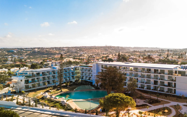Отель Castelo Suites
