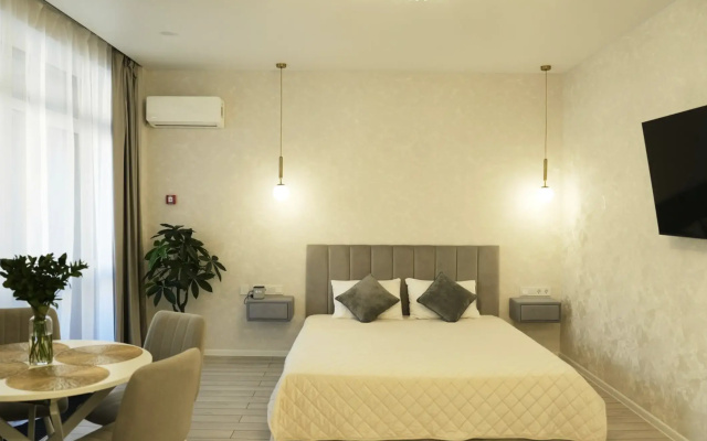Апартаменты Гарден Портье Студия Cozy Nest 1