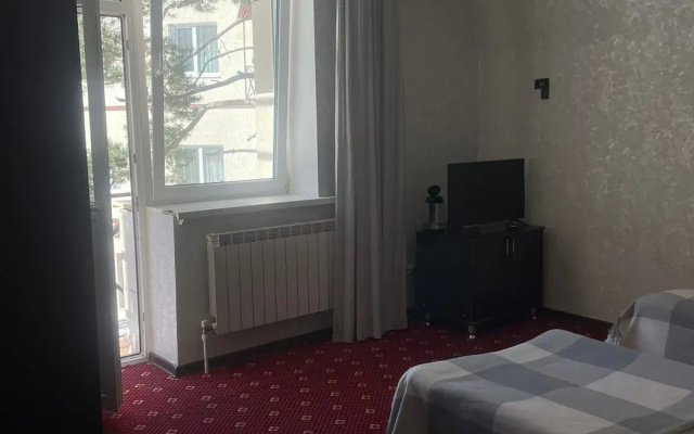 Апартаменты Уютный Номер в Сердце Домбая