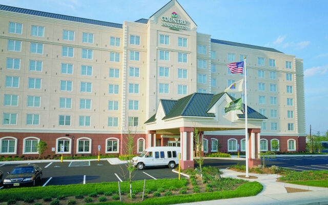 Отель Country Inn & Suites by Radisson, Newark Airport, NJ США, Элизабет - отзывы, цены и фото номеров - забронировать отель Country Inn & Suites by Radisson, Newark Airport, NJ онлайн крыльцо