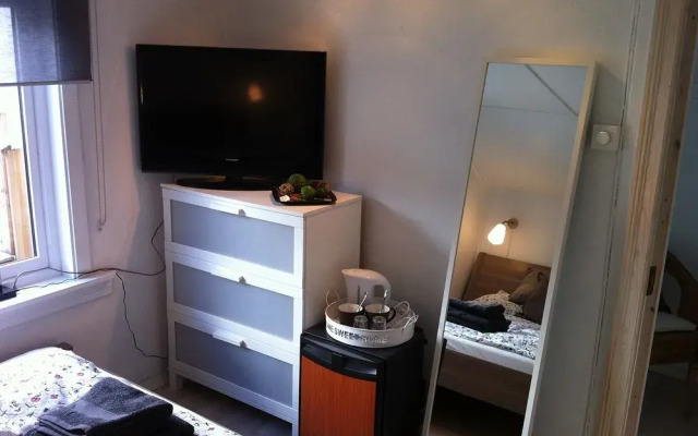 Апартаменты Bergen Apartments Берген комната для гостей