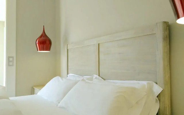 Отель BizFlats Batik Penthouse Pedralbes Испания, Барселона - отзывы, цены и фото номеров - забронировать отель BizFlats Batik Penthouse Pedralbes онлайн комната для гостей