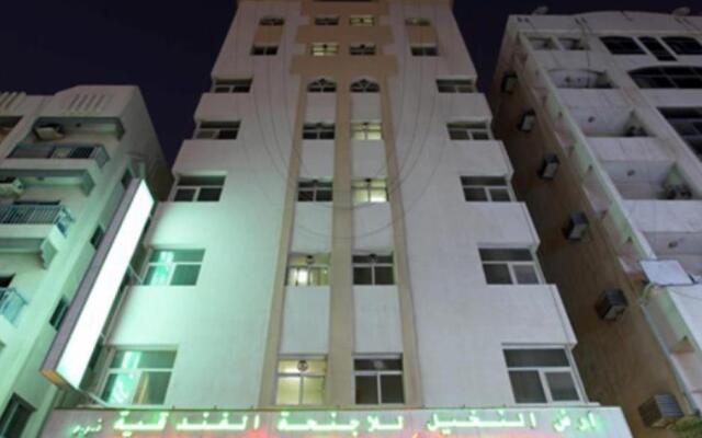 Palmland Hotel Suites вид на фасад