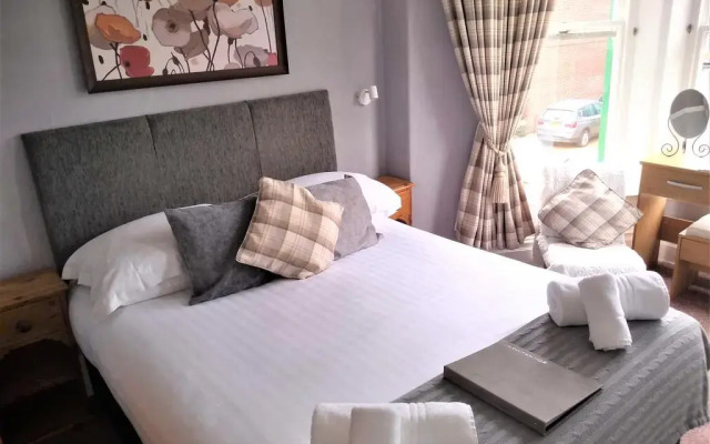 Отель Squirrel Lodge вид на фасад