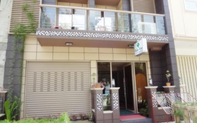 Отель Palm View Tourist Guest House Мале вид на фасад