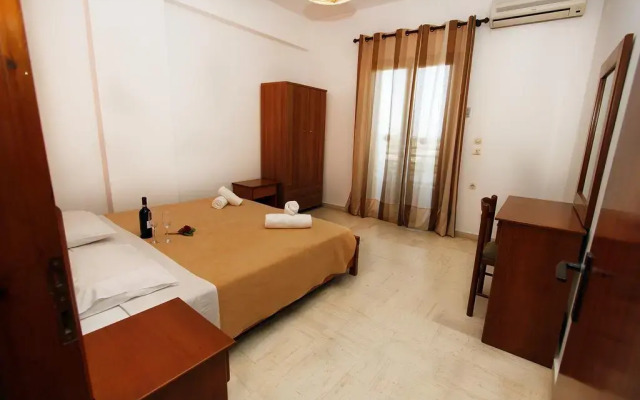 Апартаменты Lofos Apartments комната для гостей