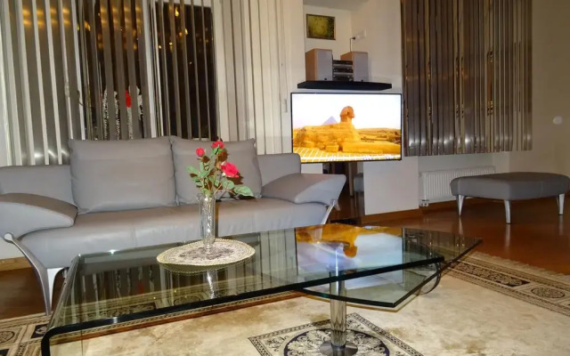 Отель Pilies Avenue Apartment Литва, Вильнюс - отзывы, цены и фото номеров - забронировать отель Pilies Avenue Apartment онлайн комната для гостей