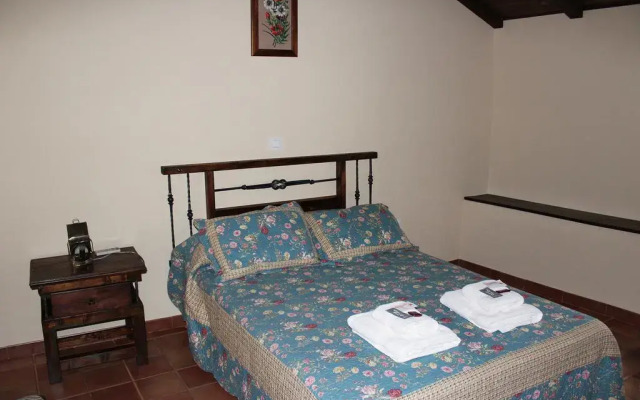Отель Casa Rural El Quinto y Medio комната для гостей