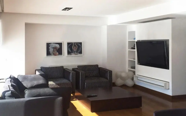 Отель The Kolonaki Penthouse комната для гостей