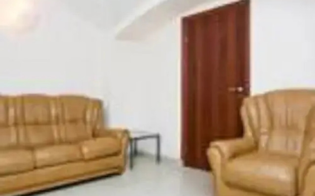 Гостиница At Home комната для гостей