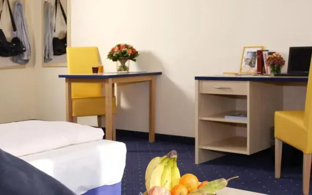 Отель Staymunich Serviced Apartments Германия, Мюнхен - отзывы, цены и фото номеров - забронировать отель Staymunich Serviced Apartments онлайн комната для гостей