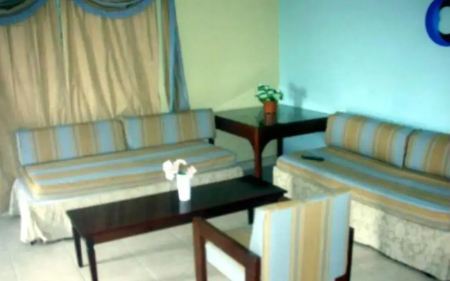 Отель Beach-side condos at Turtle Beach Towers комната для гостей