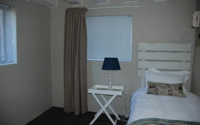 Отель Courtyard Lodging комната для гостей