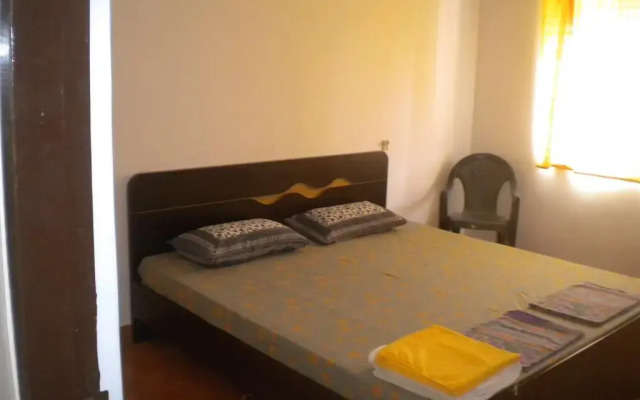 Апартаменты Lotus Benaulim - Beach Apartment Гоа комната для гостей