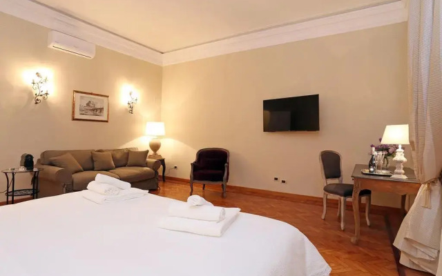 Отель Alex Suites комната для гостей