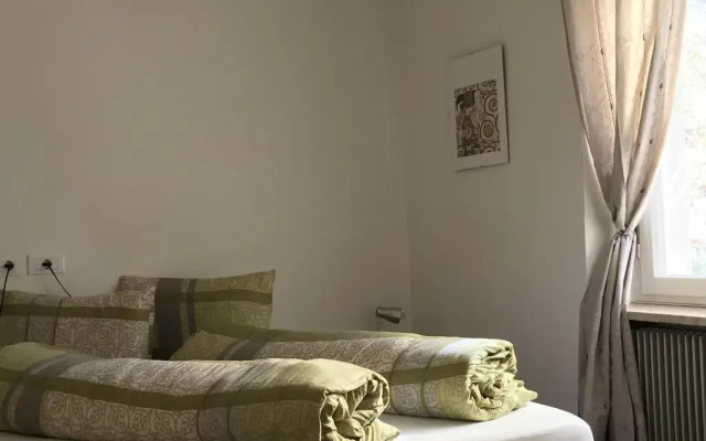 Апартаменты City Apartments Portico Меран комната для гостей
