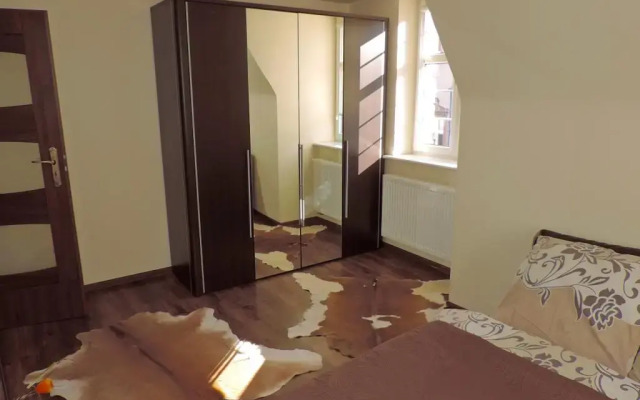 Отель Gdańskie Apartamenty - Apartament Gdańskie Poddasza Польша, Гданьск - отзывы, цены и фото номеров - забронировать отель Gdańskie Apartamenty - Apartament Gdańskie Poddasza онлайн комната для гостей