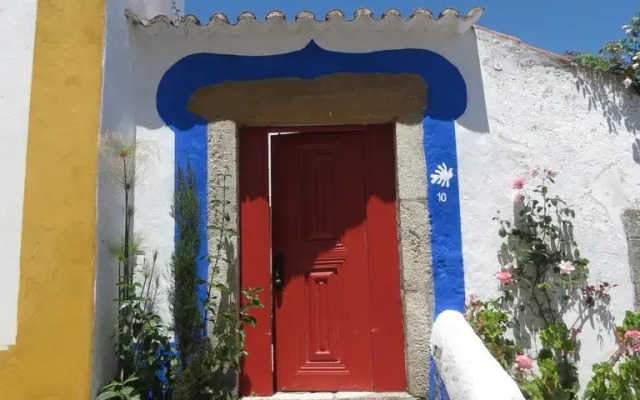 Отель A Casa Do Pássaro Branco вид на фасад