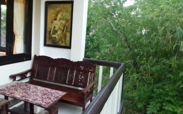 Отель CoCo Riverside Homestay Хойан комната для гостей