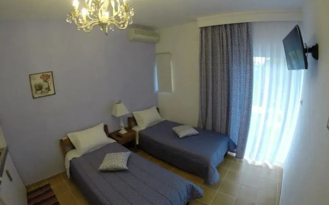 Akrotiri Hotel комната для гостей