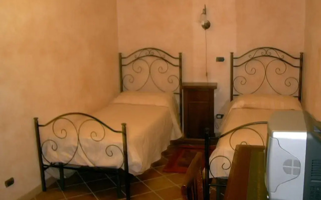 Отель Agriturismo Masseria Castiglione Кастельмеццано комната для гостей