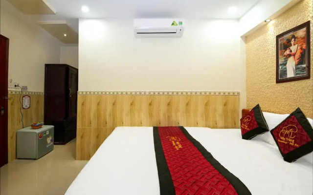 Отель Homestay May Trang Хойан комната для гостей