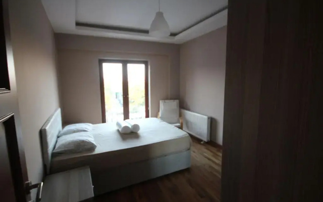 Апартаменты Topkapi Apartments комната для гостей