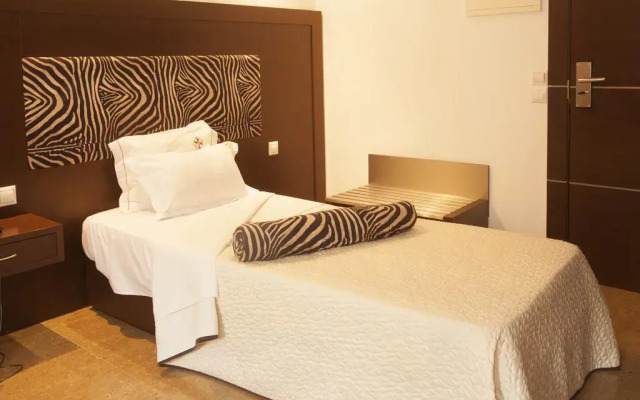 Chik-Chik Hotel Lobito I комната для гостей