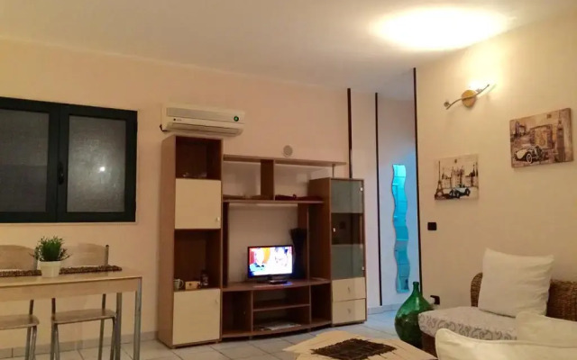 Апартаменты Salecce City Apartment Лечче комната для гостей