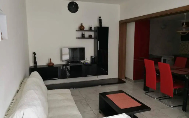 Апартаменты Simply British Apartment Каура комната для гостей