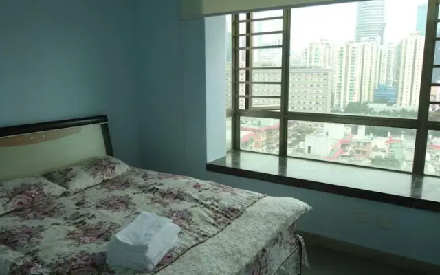 Апартаменты Yijia Apartment (Shenzhen City World) комната для гостей