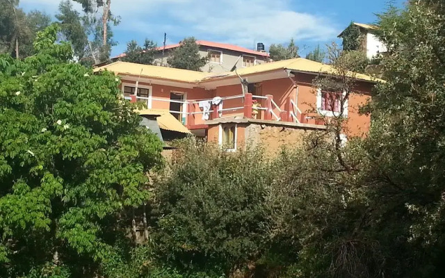 Отель Munay Lodge вид на фасад