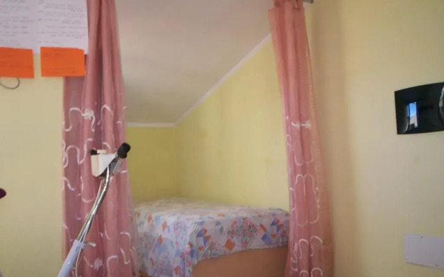 Отель Attico Bella Vista Синискола комната для гостей