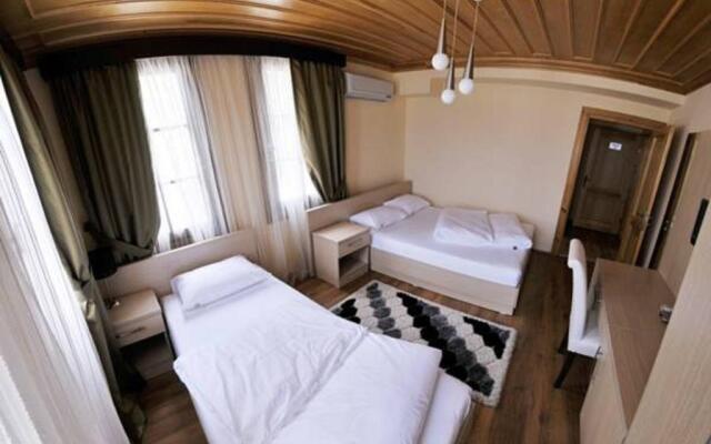 Отель Tarhan Butik Otel Армутлу комната для гостей
