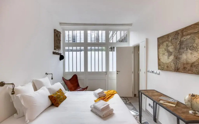 Апартаменты Sweet Inn Apartments - Rue De L'Echiquier комната для гостей