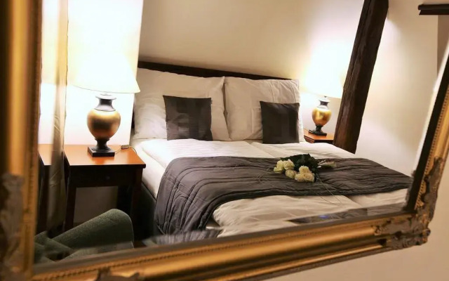 Отель Necton Prague Castle Apartments Чехия, Прага - отзывы, цены и фото номеров - забронировать отель Necton Prague Castle Apartments онлайн комната для гостей