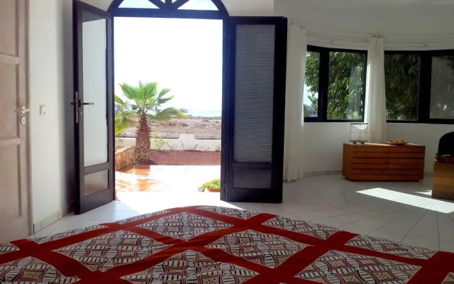 Отель Villa Paradise Beach Гинигинамар комната для гостей