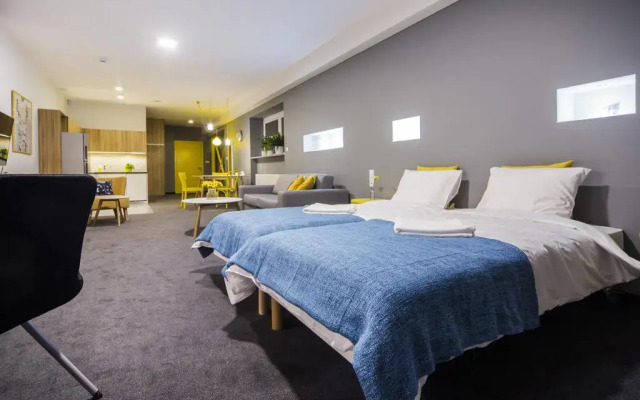 Апартаменты Mosquito Silesia Apartments Катовице комната для гостей